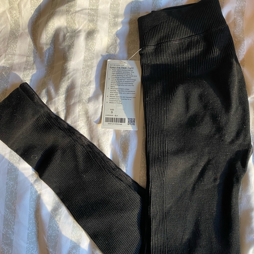 Keep the heat tight. Size small. Black. NWT